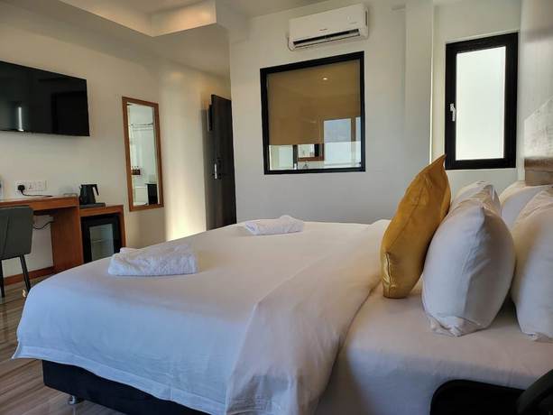 Imagen de la habitación del Hotel AIMI Beach, Gulhi Island, Maldives. Foto 8