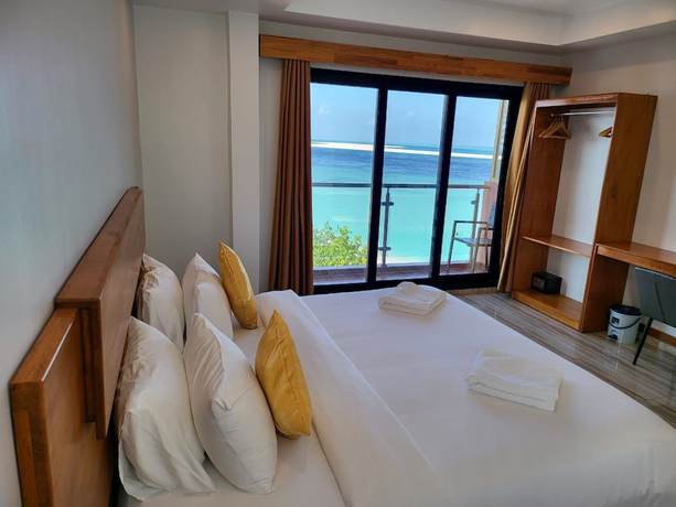 Imagen de la habitación del Hotel AIMI Beach, Gulhi Island, Maldives. Foto 9