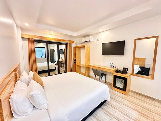 Imagen de la habitación del Hotel AIMI Beach, Gulhi Island, Maldives. Foto 10