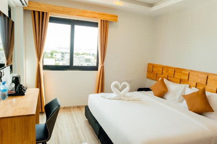 Imagen de la habitación del Hotel AIMI Beach, Gulhi Island, Maldives. Foto 12