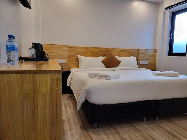 Imagen de la habitación del Hotel AIMI Beach, Gulhi Island, Maldives. Foto 15