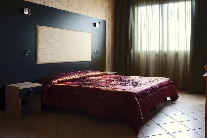 Imagen de la habitación del Hotel AIRONE, REGGIO EMILIA. Foto 4