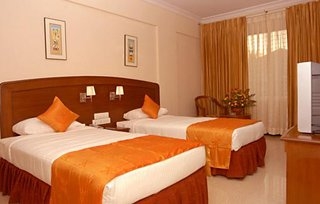 Imagen de la habitación del Hotel AJ International. Foto 4