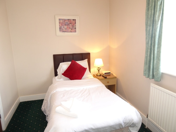 Imagen de la habitación del Hotel AJ Lodge. Foto 6