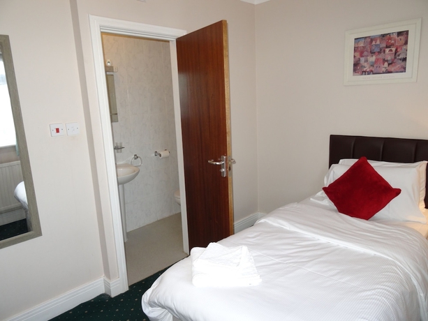 Imagen de la habitación del Hotel AJ Lodge. Foto 13
