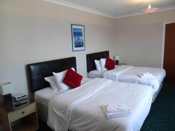 Imagen de la habitación del Hotel AJ Lodge. Foto 15