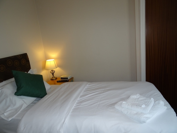 Imagen de la habitación del Hotel AJ Lodge. Foto 16