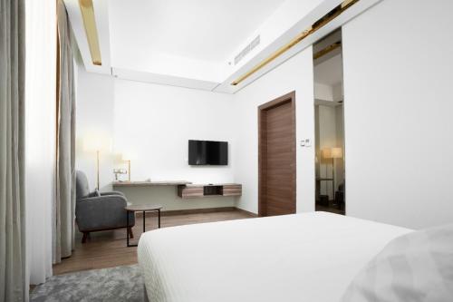 Imagen de la habitación del Hotel AKASIYA HOTEL. Foto 18