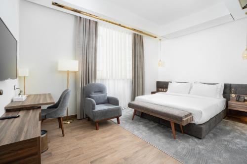 Imagen de la habitación del Hotel AKASIYA HOTEL. Foto 19