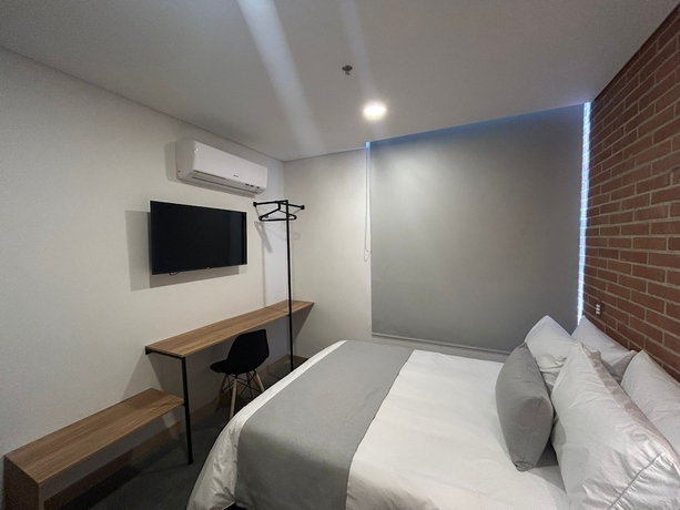 Imagen de la habitación del Hotel AKELA 30 HOTEL. Foto 1