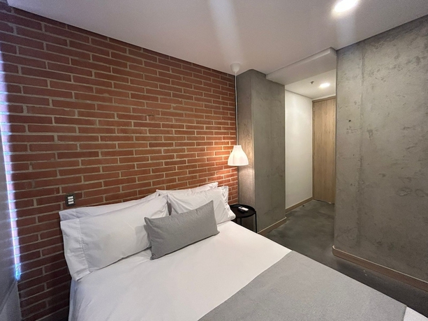 Imagen de la habitación del Hotel AKELA 30 HOTEL. Foto 2
