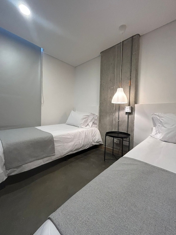 Imagen de la habitación del Hotel AKELA 30 HOTEL. Foto 6