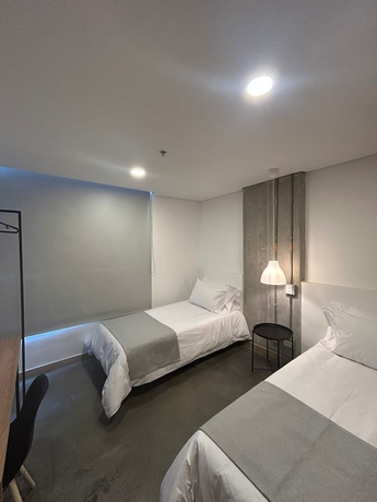 Imagen de la habitación del Hotel AKELA 30 HOTEL. Foto 8