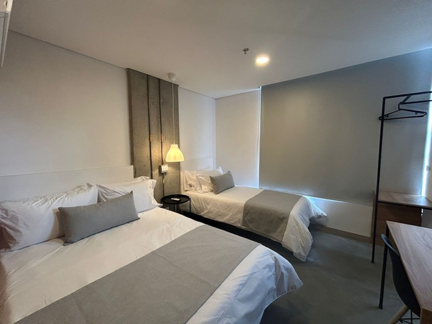 Imagen de la habitación del Hotel AKELA 30 HOTEL. Foto 11