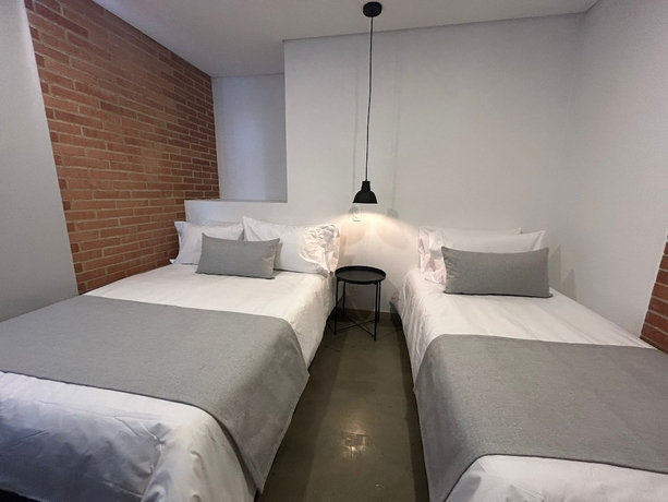 Imagen de la habitación del Hotel AKELA 30 HOTEL. Foto 12