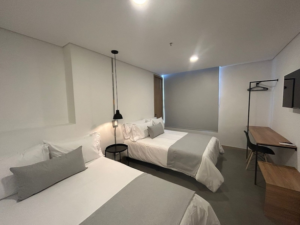 Imagen de la habitación del Hotel AKELA 30 HOTEL. Foto 13