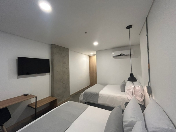 Imagen de la habitación del Hotel AKELA 30 HOTEL. Foto 14