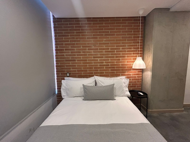 Imagen de la habitación del Hotel AKELA 30 HOTEL. Foto 16