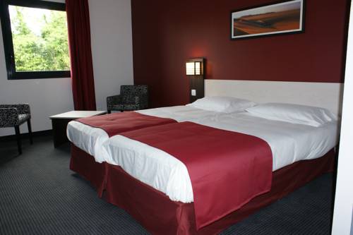 Imagen de la habitación del Hotel AKENA La Ferté Bernard. Foto 3