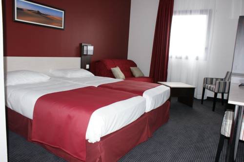 Imagen de la habitación del Hotel AKENA La Ferté Bernard. Foto 4