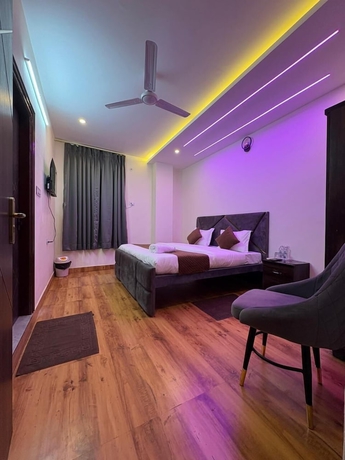 Imagen de la habitación del Hotel AKS Grand Hotel in Varanasi. Foto 7