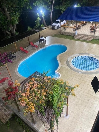 Imagen de la piscina del Hotel AKUAIPPA HOSTAL RESTAURANT. Foto 16