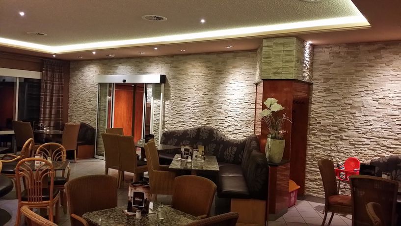 Imagen del bar/restaurante del Hotel AKZENT Stadt Schl&uuml;chtern. Foto 5