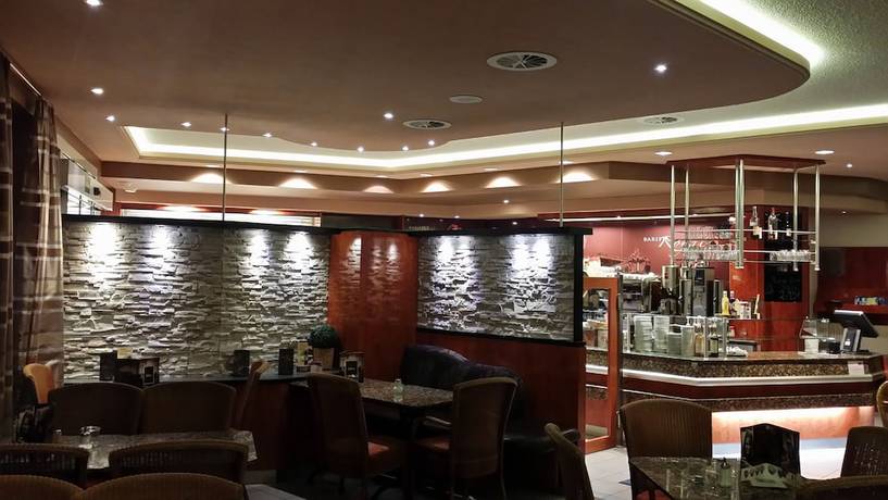 Imagen del bar/restaurante del Hotel AKZENT Stadt Schl&uuml;chtern. Foto 6