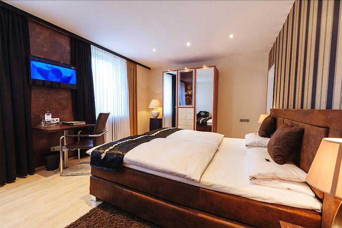 Imagen de la habitación del Hotel AKZENT Tietmeyer. Foto 11