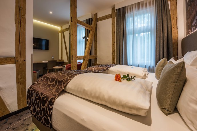 Imagen de la habitación del Hotel AKZENT Villa Saxer. Foto 13