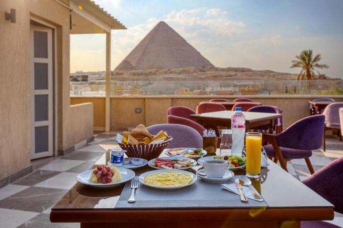 Imagen de la habitación del Hotel AL Farida Boutique Pyramids. Foto 8