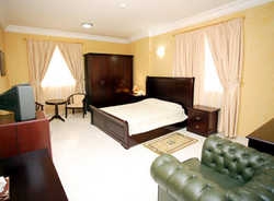 Imagen de la habitación del Hotel AL MOUROUJ INN. Foto 1