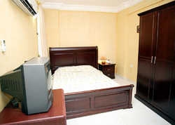 Imagen de la habitación del Hotel AL MOUROUJ INN. Foto 2