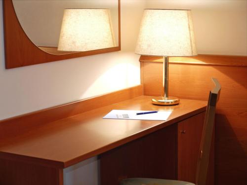 Imagen de la habitación del Hotel ALA. Foto 10