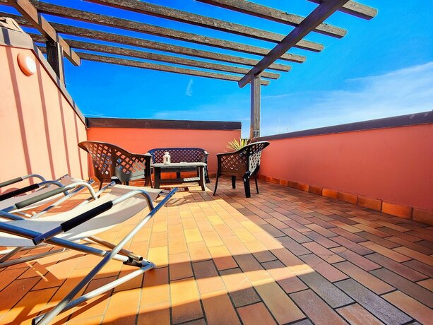 Imagen de la habitación del Hotel ALBERGO BandB TENESI. Foto 17