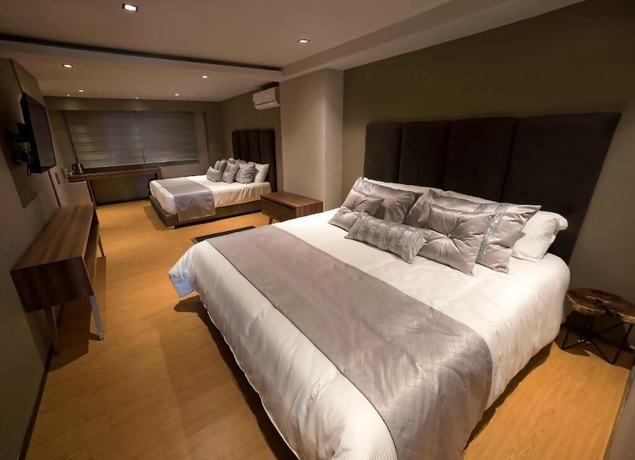 Imagen de la habitación del Hotel ALBURA HOTEL. Foto 4