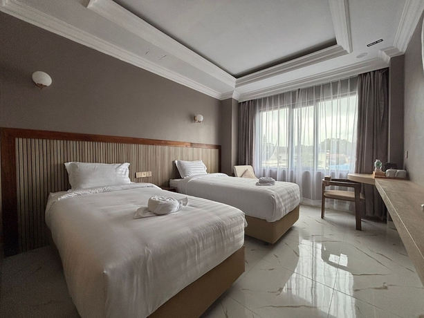 Imagen de la habitación del Hotel ALESHA HOTEL. Foto 8