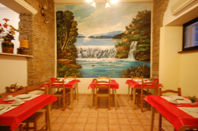 Imagen del bar/restaurante del Hotel ALEXIS, Roma. Foto 2