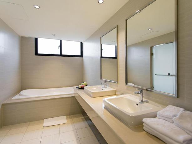 Imagen de la habitación del Hotel ALI MOUNTAIN ORIENTAL PEARL INTERNATIONAL HOTEL. Foto 5