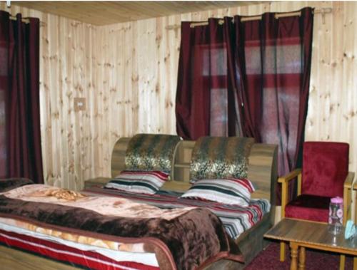 Imagen de la habitación del Hotel ALIO Sonamarg. Foto 19