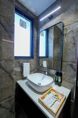 Imagen de la habitación del Hotel ALIVAA boutique DLF Cybercity Gurugram. Foto 5