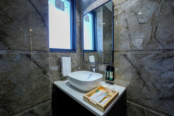 Imagen de la habitación del Hotel ALIVAA boutique DLF Cybercity Gurugram. Foto 6