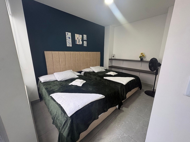 Imagen de la habitación del Hotel ALOJAMIENTOS LA MARTIN. Foto 14