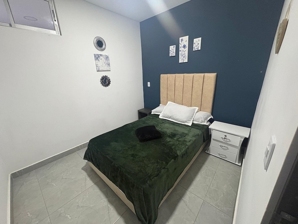 Imagen de la habitación del Hotel ALOJAMIENTOS LA MARTIN. Foto 15