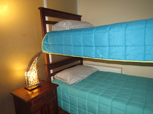 Imagen de la habitación del Hotel ALOJAMIENTOS SANTIAGO CHILE. Foto 4