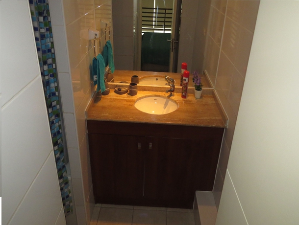 Imagen de la habitación del Hotel ALOJAMIENTOS SANTIAGO CHILE. Foto 6