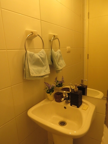 Imagen de la habitación del Hotel ALOJAMIENTOS SANTIAGO CHILE. Foto 11
