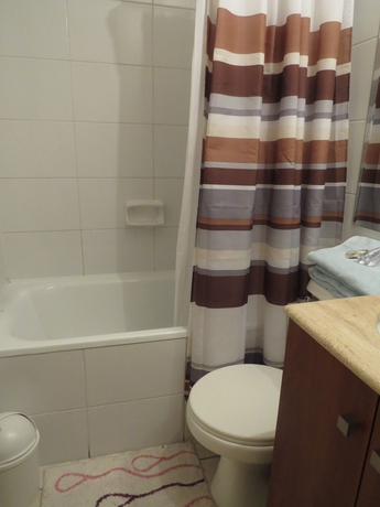 Imagen de la habitación del Hotel ALOJAMIENTOS SANTIAGO CHILE. Foto 12