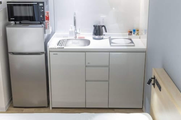 Imagen de la habitación del Hotel ALPHABED INN NahaKokusaiStreet WEST. Foto 15
