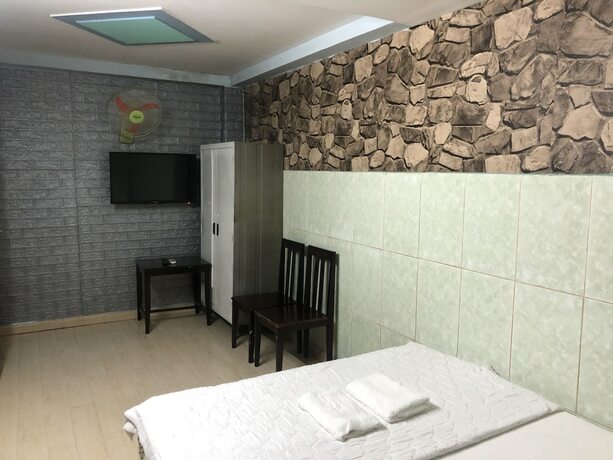 Imagen de la habitación del Hotel A-Loi. Foto 8